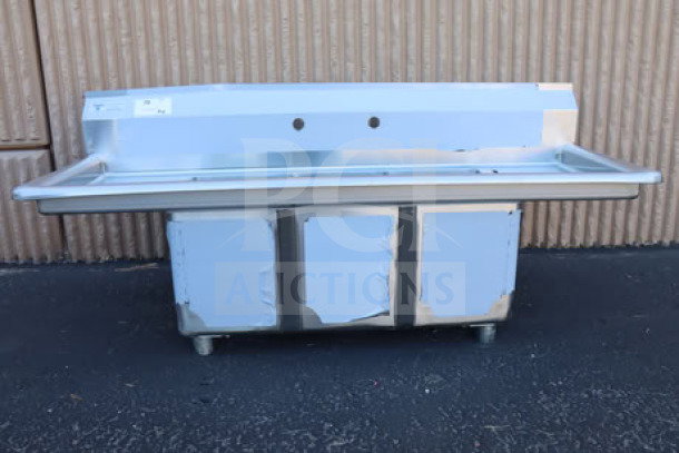 Steelton 54" three-compartment commercial sink, model 522CS31014LR, with two 12" drainboards. Brand new scratch-and-dent condition.