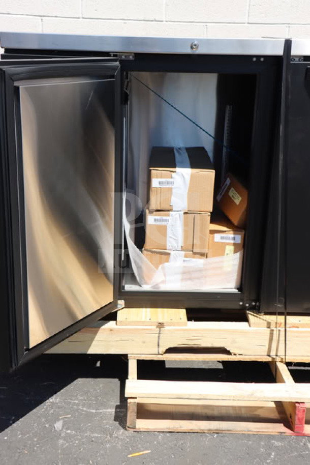 BRAND NEW True TDR72-RISZ1-L-B-SSS-1 kegerator with open door, showing boxes inside. Black, includes 2 stainless steel insulated taps.