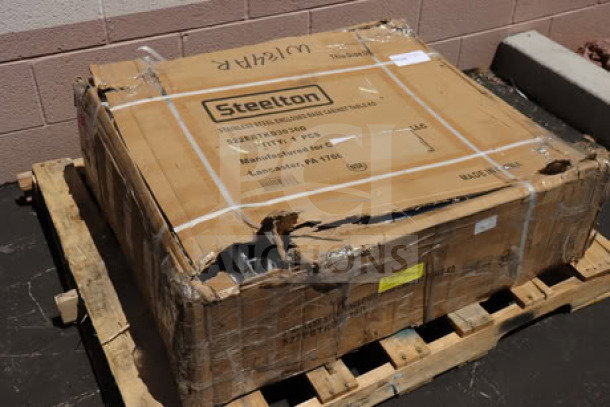 Steelton 522EBTKD3036D 30" x 36" 16 Gauge Type 430 Stainless Steel Enclosed Base Sliding Door Table in original damaged box.
