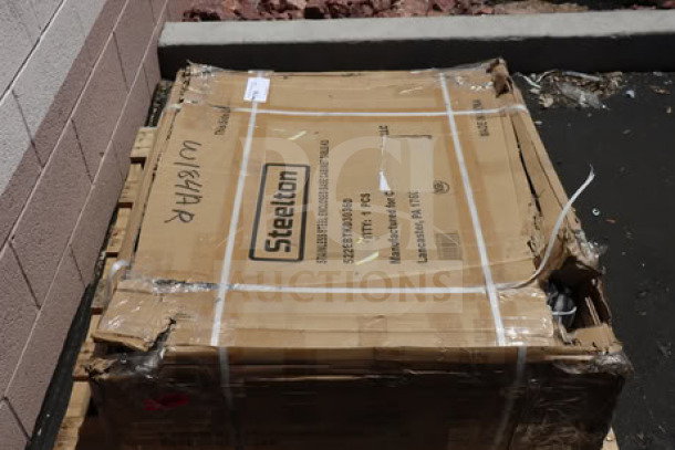 Brand new Steelton 522EBTKD3036D 30" x 36" stainless steel table, scratch-n-dent, in original packaging with visible label.