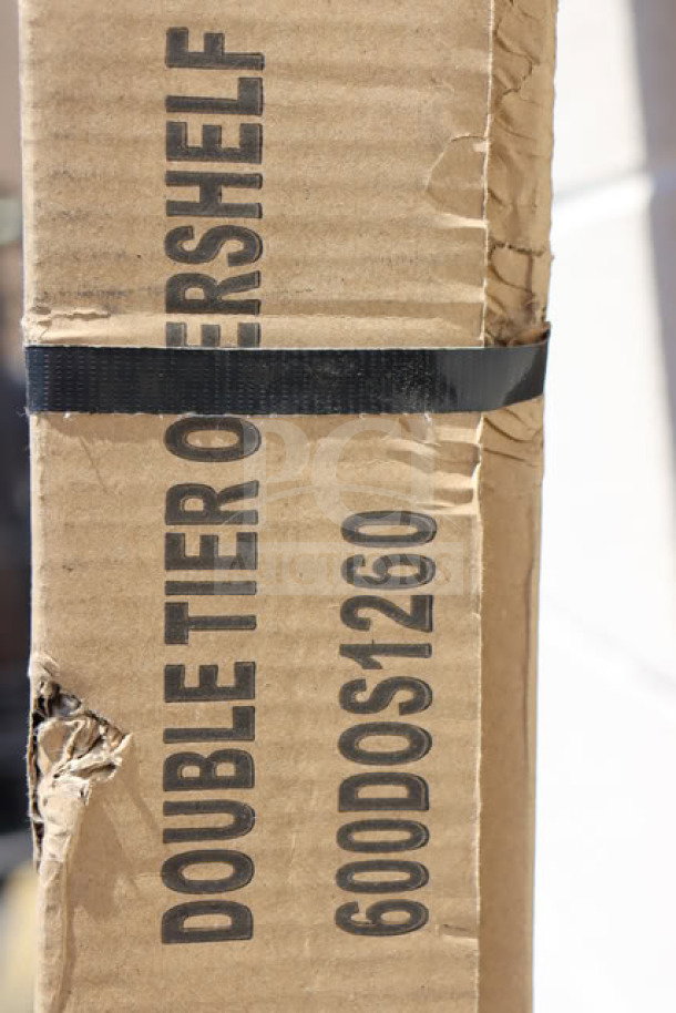 Regency 600DOS1260 Stainless Steel Double Deck Overshelf packaging, showing label and slight box damage.