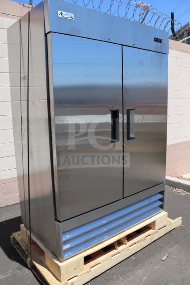 Brand new Avantco A-49F-HC 54" solid door reach-in freezer on a pallet. Slight scratches visible. 115V, 8.5A, 780W.