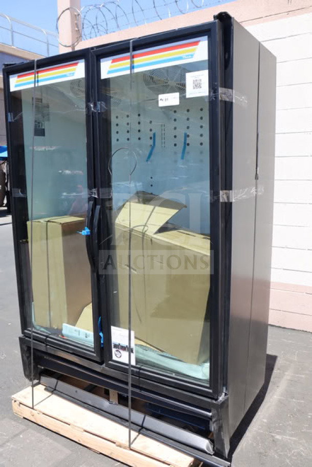 Brand new True FLM-54~TSL01 black refrigerated glass door merchandiser. LED lighting, full-length doors, tested working.