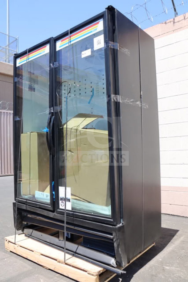 Brand new True FLM-54 TSL01 black refrigerated glass door merchandiser. Features LED lighting, full-length doors, 115V, tested working.