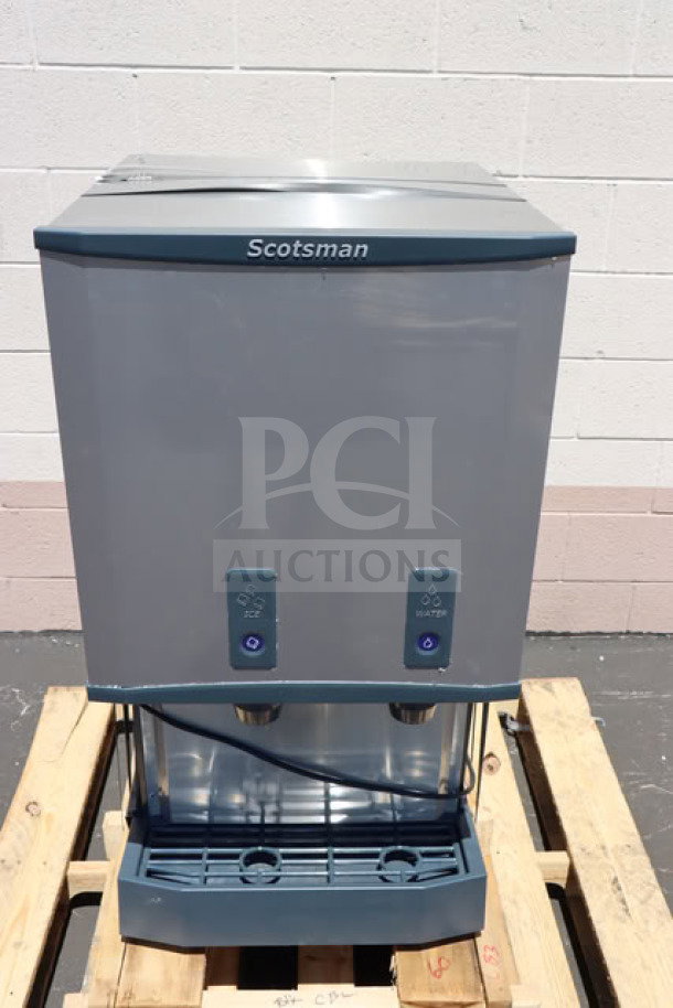 Brand new Scotsman HID540WBX-1A water-cooled ice machine and dispenser, 40 lb. bin, 115V, push button, serial: 26031320011384.