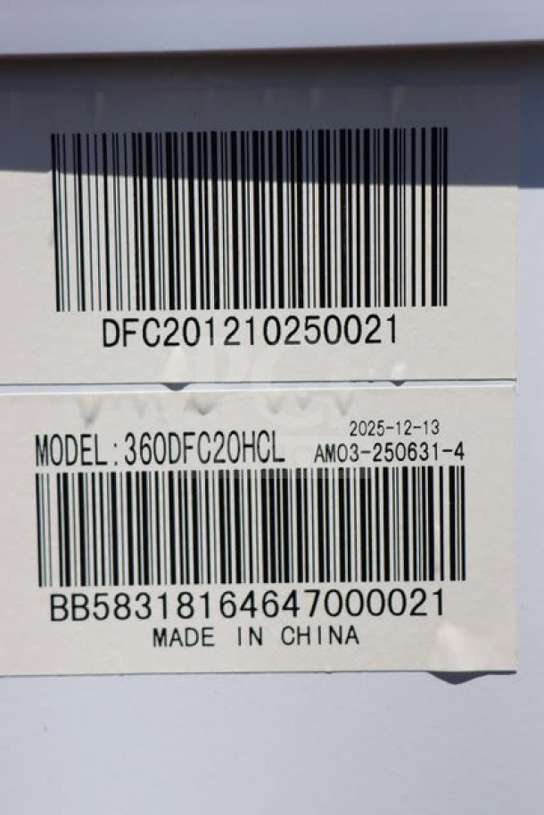 Avantco DFC20-HCL display freezer barcode tags showing model and serial number details. Made in China.