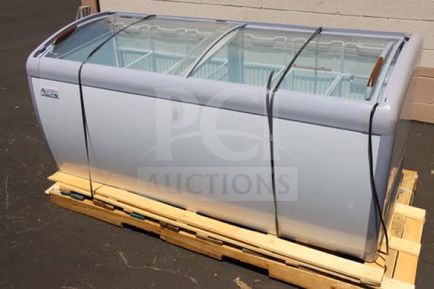 Brand new Avantco DFC20-HCL ice cream freezer, curved top, 115V, scratch-n-dent condition, on a pallet.