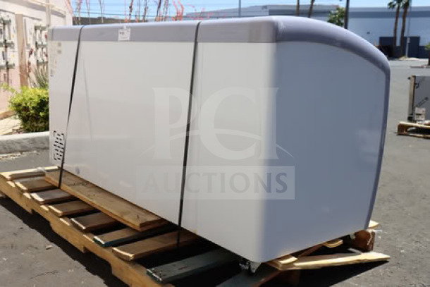 Brand new Avantco DFC20-HCL curved top display ice cream freezer on a pallet, scratch-n-dent condition, tested operational.