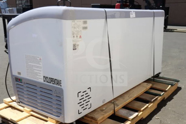 Brand new Avantco DFC20-HCL ice cream freezer, curved top, 70 7/8", 115V, 4A, tested, minor scratches, with labels visible.