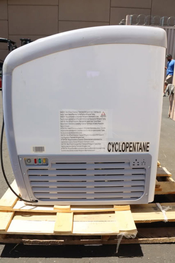 Brand new Avantco DFC20-HCL ice cream freezer, scratch-and-dent, curved top, 115V, 70 7/8", on wooden pallet.