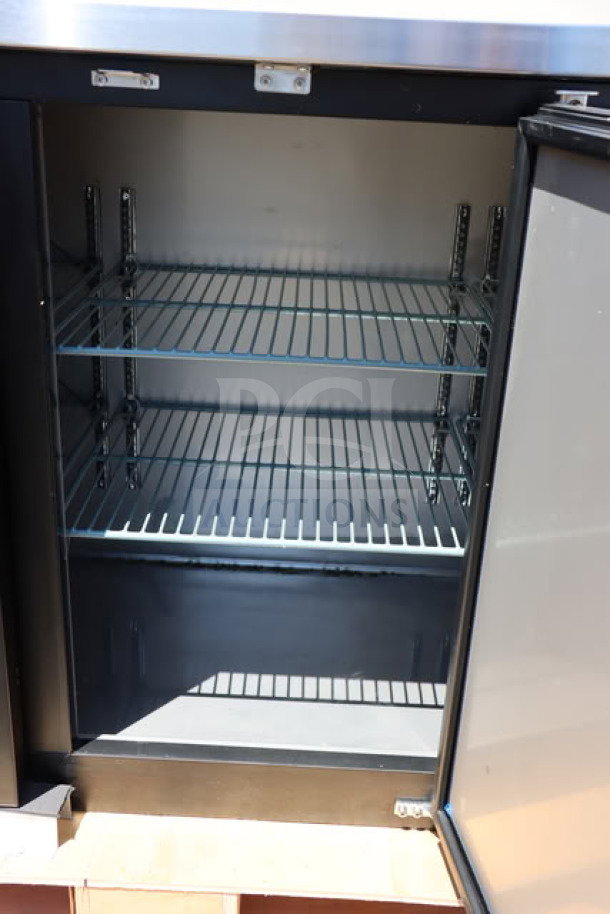 Brand new Avantco UBB-72-HC back bar refrigerator, 73" black, counter height, solid door, LED lighting, tested working.