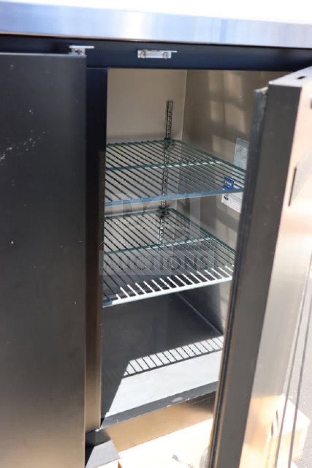 Brand new Avantco UBB-72-HC back bar refrigerator, black, 73", LED lighting, tested and in working order, minor scratches.