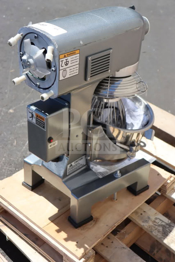 Brand new Avantco MX10H 10 Qt. Planetary Stand Mixer with safety guard and accessories, visible caution labels, 3/4 hp, 120V.