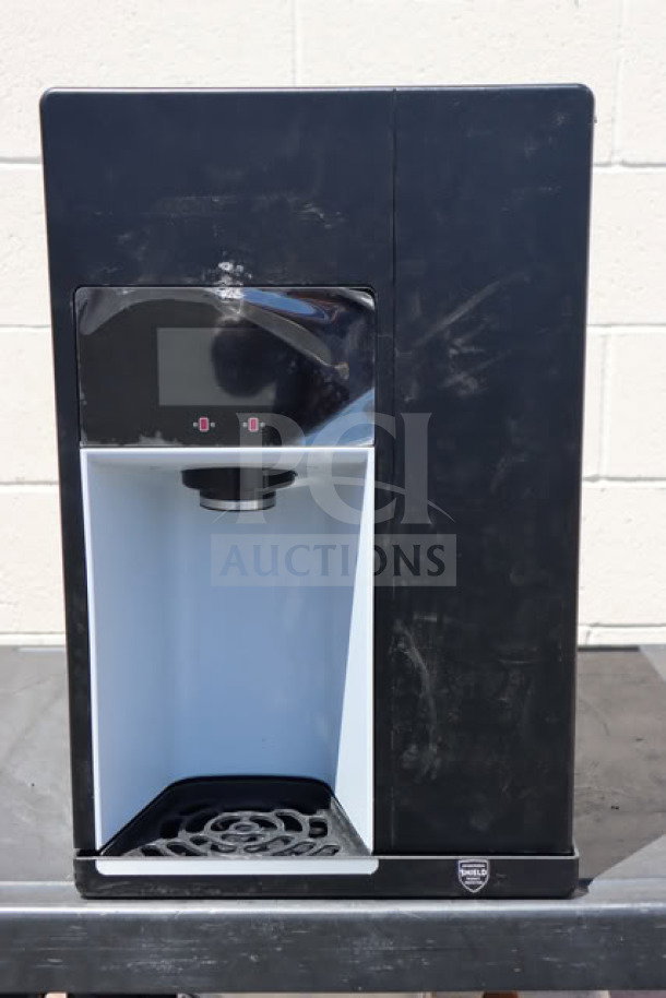 Brand new Follett 15CI114A-IW-NF-ST-00 ice maker, black, air-cooled, 15 lb. bin, minor dents and dings, 115V, 100 lb. capacity.