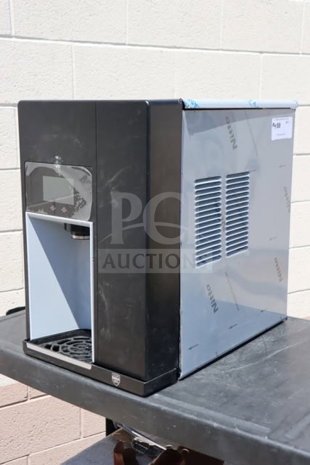 Follett 15CI114A-IW-NF-ST-00 countertop ice maker, minor dents, 15 lb. bin, air-cooled, 115V, no original box.