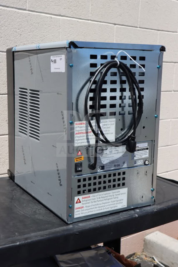 BRAND NEW Follett 15CI114A-IW-NF-ST-00 Ice Maker, minor dents. 100 lb. capacity, air-cooled, countertop model, 115V.