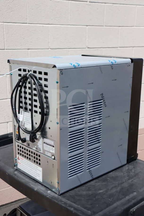 BRAND NEW Follett 15CI114A-IW-NF-ST-00 countertop ice maker, 100 lb. capacity, minor dents, air-cooled, 115V, 15 lb. bin.
