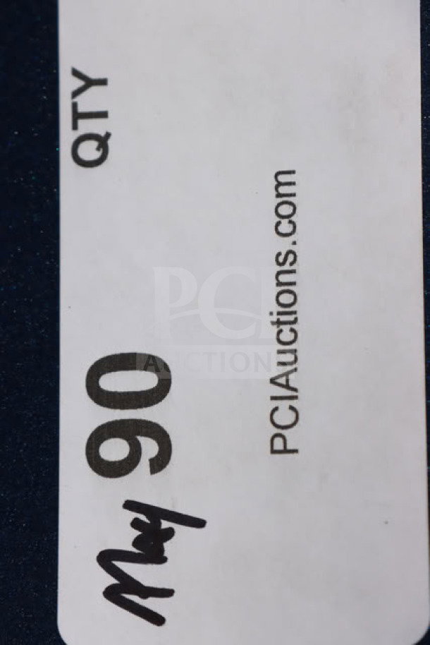 This image shows a tag with "QTY 90" and "PCIAuctions.com." The number "90" is handwritten with "May" below it.