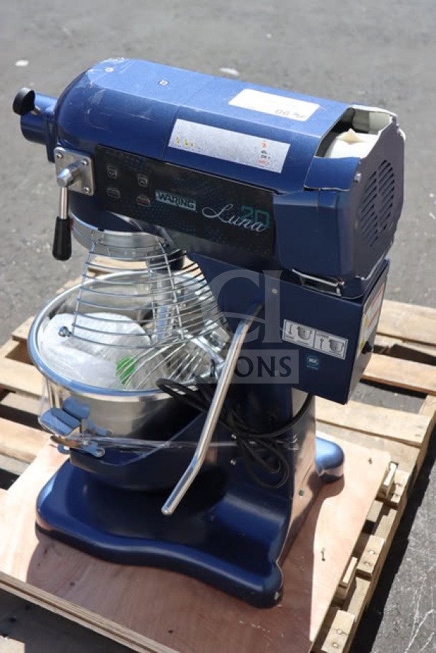 BRAND NEW Waring Luna WSM20LT 20 Qt. Planetary Stand Mixer with guard and timer, navy blue, on a wooden pallet.