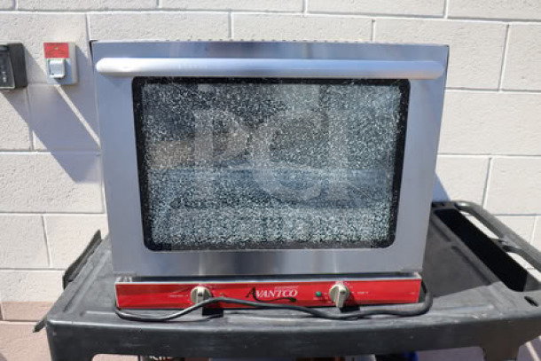Brand new Avantco CO-28M half-size countertop convection oven, 2.3 cu. ft., 208/240V, visible scratches.