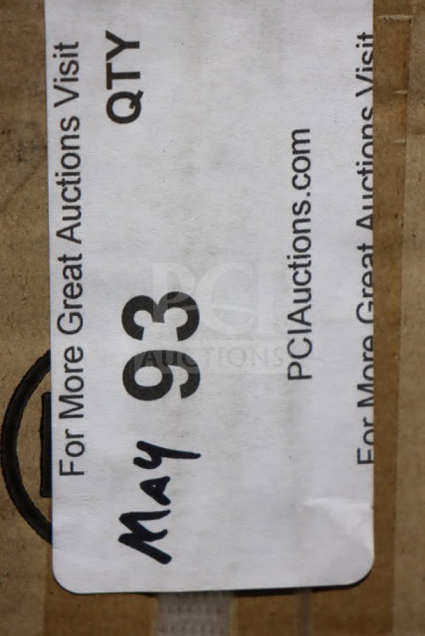 Cardboard box label reads "May 93," associated with PCIauctions.com. Box is damaged, contains Regency dishtable.