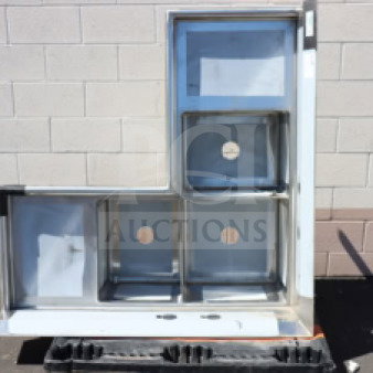Brand new Regency 600S31620C 57" three-compartment corner sink with two 18" drainboards, scratch-n-dent condition.