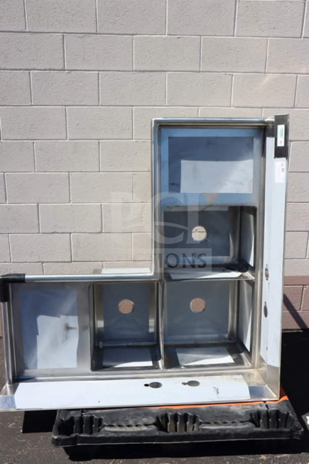 Brand new Regency 600S31620C corner sink, three compartments, two 18" drainboards. Scratch-n-dent condition.