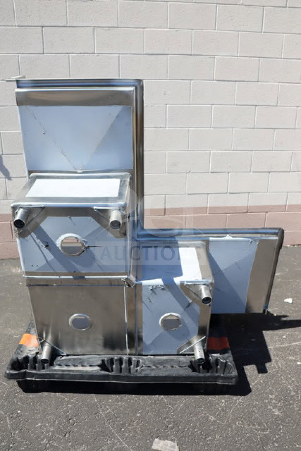 Brand new Regency 600S31620C 57" three-compartment corner sink with two 18" drainboards, visible scratch-n-dent condition.