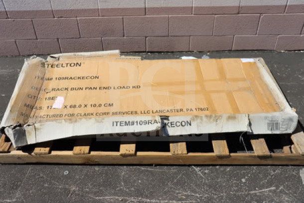 Brand new Steelton 20 Pan End Load Bun/Sheet Pan Rack, Model 109RACKECON, unassembled in damaged box, may be missing parts.