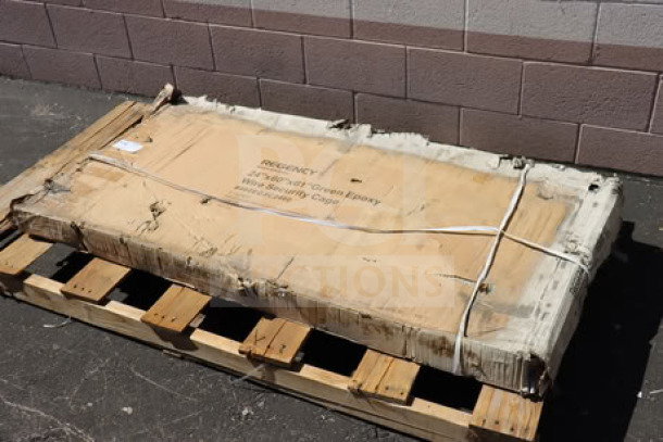 BRAND NEW Regency 460EGSC2460 NSF Green Wire Security Cage, 24" x 60" x 61", in damaged packaging on pallet.