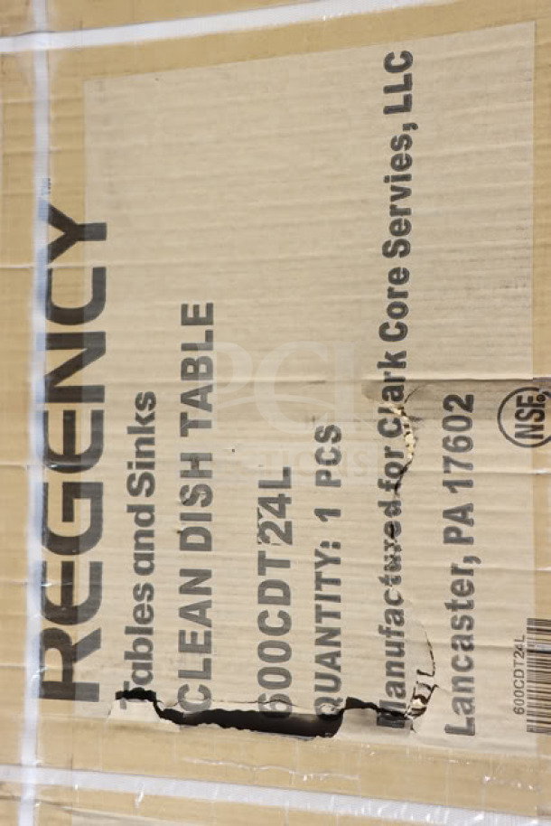 Regency 16 Gauge 2' Clean Dish Table, model 600CDT24L, new in box with left drainboard. Box shows product details and NSF logo.