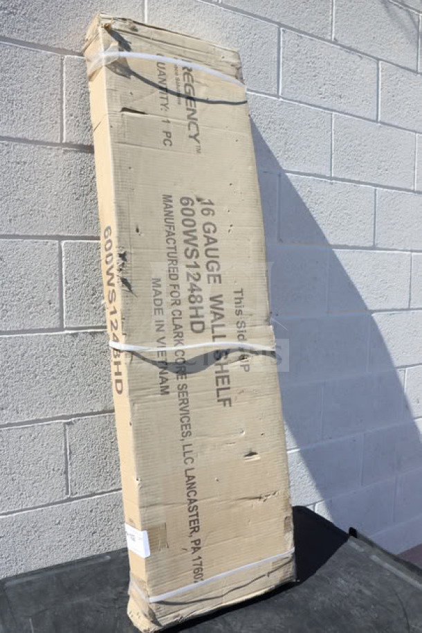 Brand new Regency 600WS1248HD 16-gauge stainless steel wall shelf, boxed, 12" x 48", heavy duty, made in Vietnam.