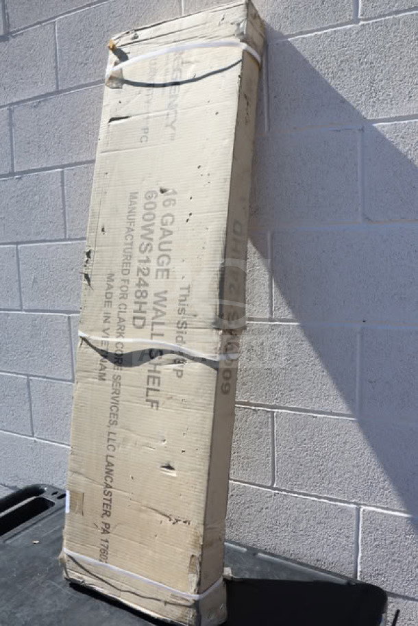 Brand new Regency 600WS1248HD 16 gauge stainless steel wall shelf in box. Box shows model and 12" x 48" size.