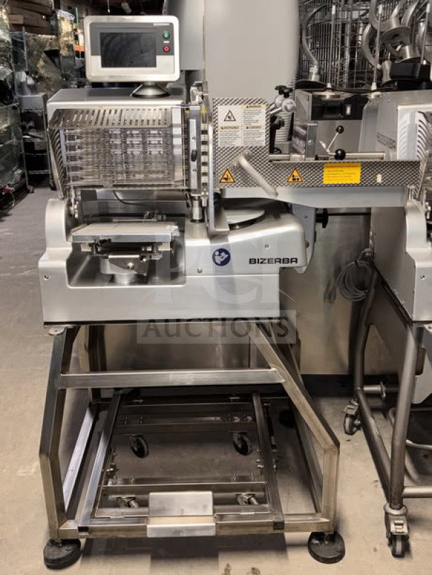 Bizerba VSI330 F W electric meat slicer, 13" blade, touchscreen, portion scale, on stainless steel stand with casters.