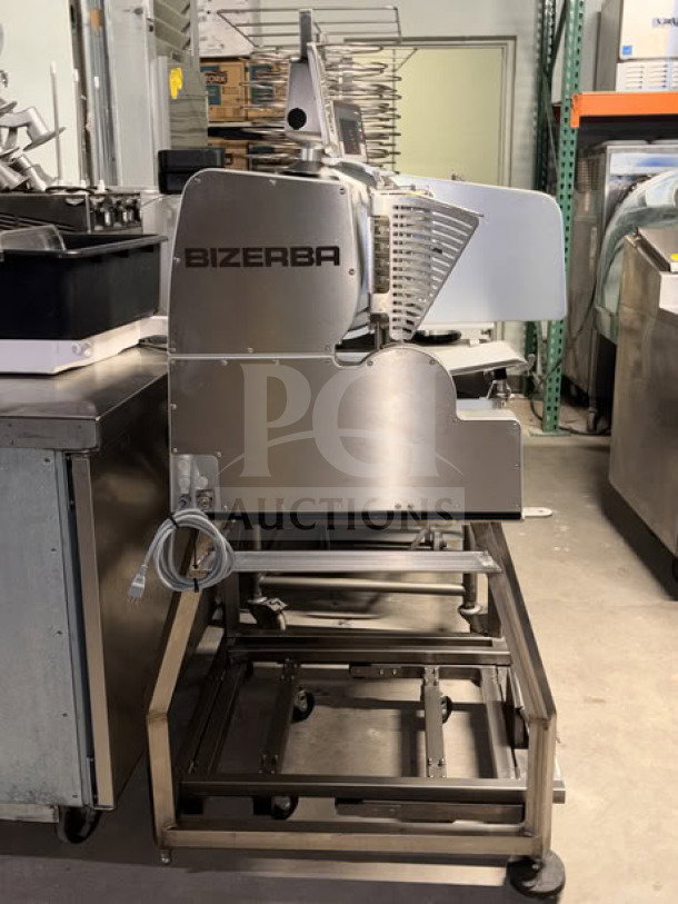 Bizerba VSI330 F W electric meat slicer, 13" blade, on stainless steel mobile stand with casters. Touchscreen controls, IPX5 washdown design, and programmable slicing.