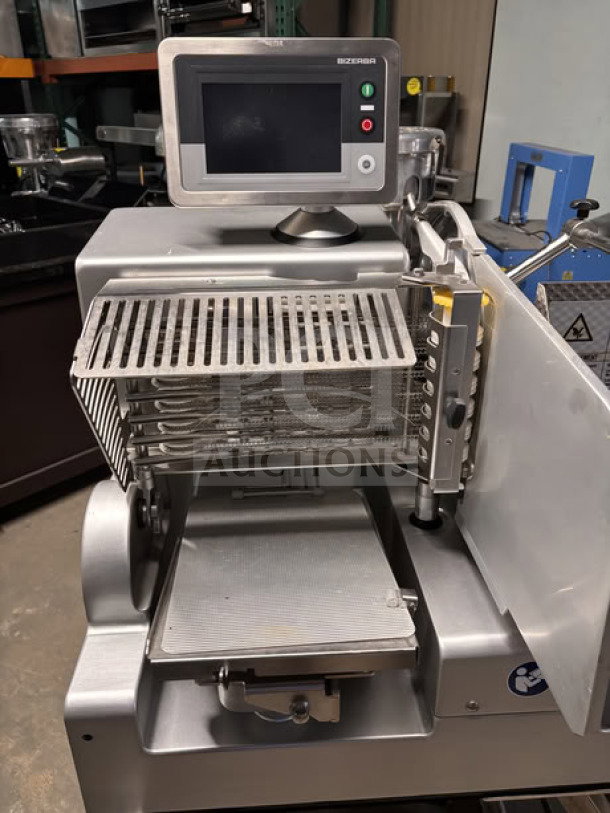 Bizerba VSI330 F W electric meat slicer with 13” blade, touchscreen, portion scale, and stainless stand. Used, great condition.