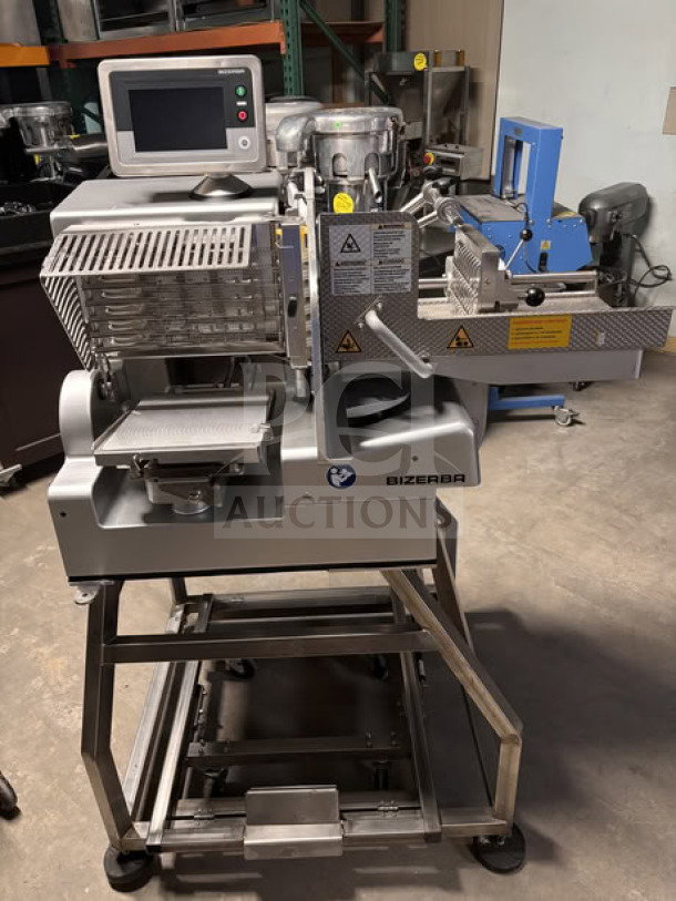 Bizerba VSI330 F W electric meat slicer with 13” blade, touchscreen controls, portion scale, on stainless steel mobile stand.
