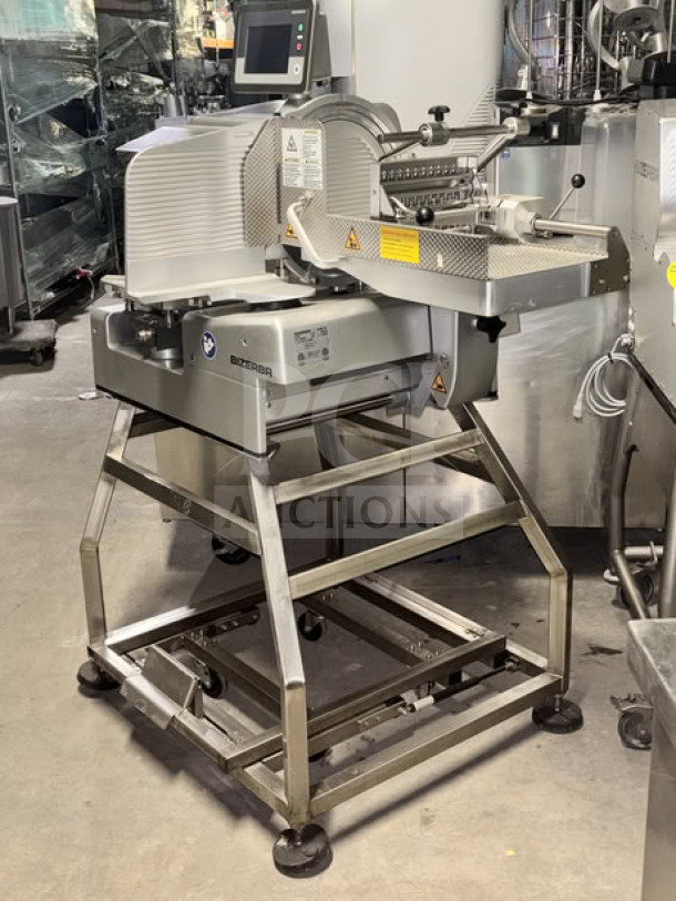 Bizerba VSI330 F W electric meat slicer, 13” blade, automatic with portion scale, touchscreen, on stainless steel stand with casters.