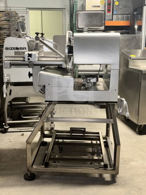 Bizerba VSI330 F W electric meat slicer, 13” blade, touchscreen controls, on stainless steel mobile stand with casters.