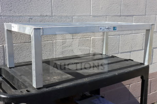 Brand new New Age 6000 Series 36"x20"x12" aluminum dunnage rack, model 6004, supports 2,000 lbs. Out of box.