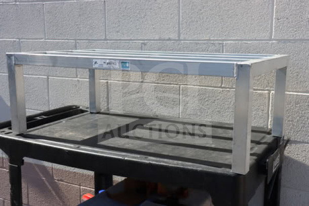 New Age 6000 Series aluminum dunnage rack, model 6004, 36"x20"x12", 2,000 lb. capacity, brand new, no box, visible labels.