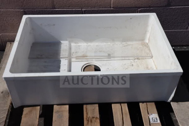 Zurn Elkay Z1996-24-AW white composite mop sink, 24"x24"x10", new with dirt and dust, on pallet.