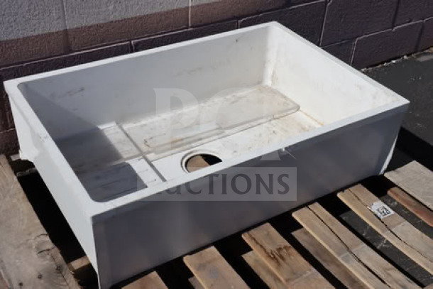 Brand new Zurn Elkay Z1996-24-AW white composite mop sink, 24"x24"x10". Scratch-n-dent, with dirt and dust present.