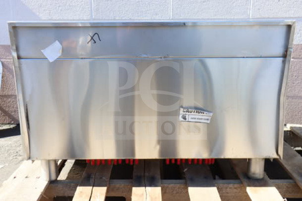 Regency underbar ice bin, 21"x30", stainless steel, scratch-n-dent, with cold plate, bottle holders, capacity 65 lb.