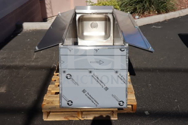 Brand new Eagle Group F1916-VSCS stainless steel mop sink cabinet, 430 Series, 22 1/4" x 25" x 84 1/4", on a pallet.