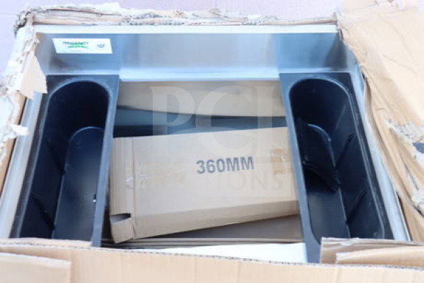 Regency 6001B1824 18" x 24" stainless steel underbar ice bin with bottle holders, new in damaged box.