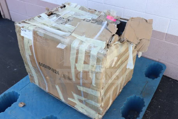 Damaged packaging of Regency 6001B1824 stainless steel underbar ice bin with bottle holders, 18" x 24", new condition.