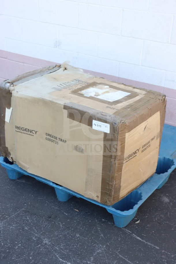 Brand new Regency 600GT35 grease trap in box, 70 lb, 35 GPM capacity, PDI certified, with 3" non-threaded connections.