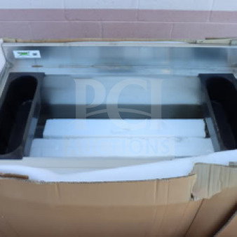 Regency 600IB2136 stainless steel underbar ice bin, 21"x36", with bottle holders in ripped packaging. Brand new condition.