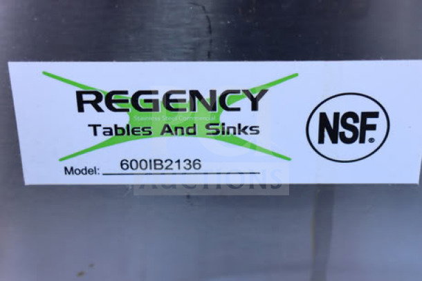 Regency 600IB2136 label on stainless steel underbar ice bin. Model and NSF mark visible. Packaging is ripped.